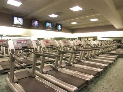 Picture of A serene row of treadmills awaits the early risers at Prime Time Athletic Club, where quality outcomes are the norm. Here, fitness meets precision, ensuring members experience top-rated facilities. Copyright ©2025 Diamond Certified Resource

 - Prime Time Athletic Club