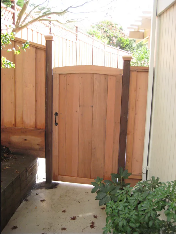 Picture of A newly installed wooden gate stands elegantly, showcasing California Fencing's commitment to quality outcomes. Known for their expertise and quality, they ensure each project exudes precision and craftsmanship. Copyright ©2025 Diamond Certified Resource

 - California Fencing