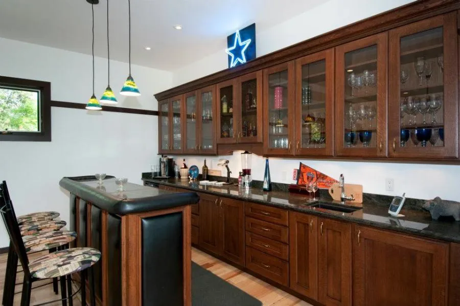 Picture of In a serene corner, Gold Hammer Construction, Inc. showcases its craftsmanship with custom cabinetry adorned with glassware. Renowned for focusing on quality outcomes, the company creates inviting spaces. Copyright ©2025 Diamond Certified Resource. - Gold Hammer Construction, Inc.