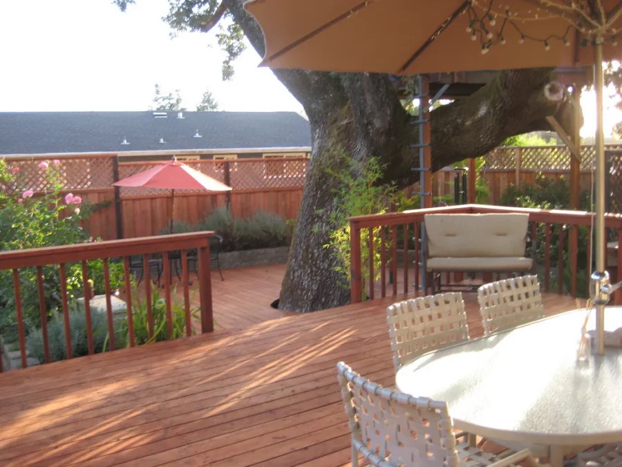 Picture of The tranquil backyard deck showcases California Fencingâ€™s dedication to blending functionality with nature, framing a serene outdoor space. This company is recognized for expertise and quality. Copyright ©2025 Diamond Certified Resource - California Fencing