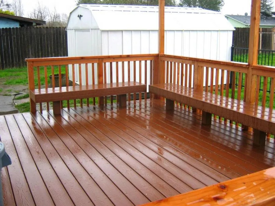 Picture of  The newly built wooden deck, glistening after a light rain, showcases Gold Hammer Construction, Inc.'s commitment to quality outcomes. This attention to detail is why they consistently achieve high customer satisfaction. Copyright ©2025 Diamond Certified Resource.

 - Gold Hammer Construction, Inc.