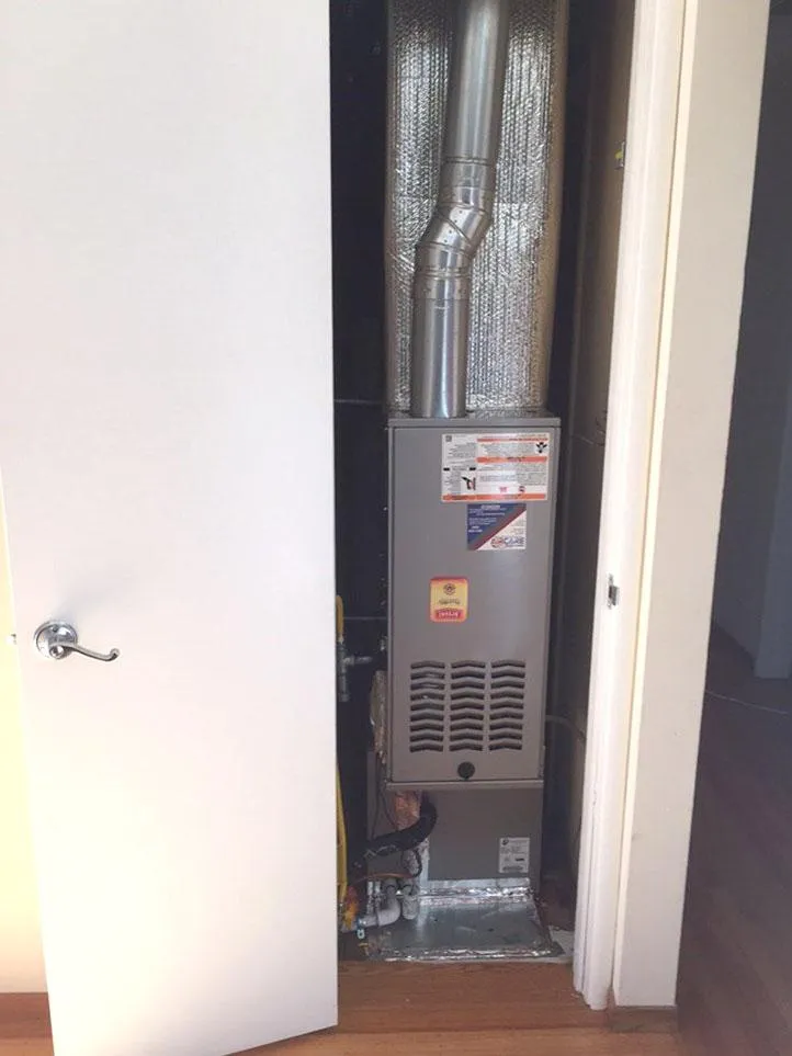 Picture of In a quiet corner, a furnace stands ready, its sleek ductwork a testament to meticulous installation. Air Care Heating & Cooling, Inc. ensures each system performs with excellence, consistently achieving a Highest in Quality rating. Copyright ©2025 Diamond Certified Resource. - Air Care Heating & Cooling, Inc.