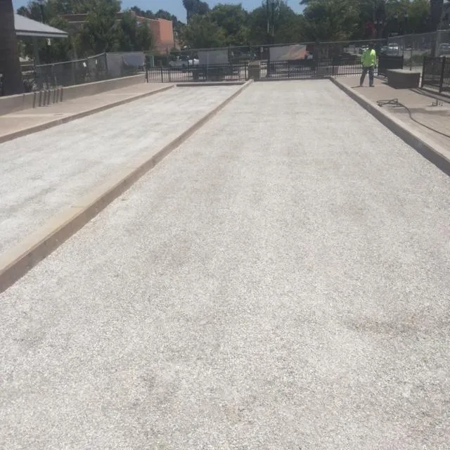 Picture of  A freshly prepared gravel area waits for its purpose under the careful supervision of a Bay Area Drainage, Inc. worker. The company’s focus on quality outcomes is clearly demonstrated in their meticulous work. Copyright ©2025 Diamond Certified Resource.

 - Bay Area Drainage, Inc.