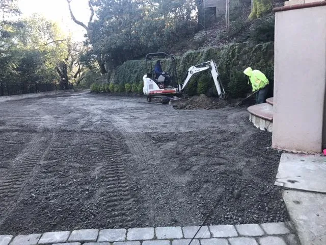 Picture of In a serene landscape transformation, Bay Area Drainage, Inc. demonstrates its expertise by meticulously preparing the ground for optimal drainage. This project underscores the company’s focus on quality outcomes. Copyright ©2025 Diamond Certified Resource. - Bay Area Drainage, Inc.