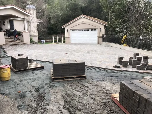 Picture of  A neatly paved driveway unfolds with precision, revealing Bay Area Drainage, Inc.'s commitment to quality outcomes. Their expertise ensures every stone is perfectly placed, reflecting their top-rated craftsmanship. Copyright ©2025 Diamond Certified Resource.

 - Bay Area Drainage, Inc.