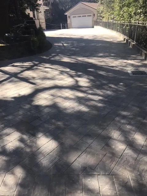 Picture of The driveway's intricate paving reveals Bay Area Drainage, Inc.'s dedication to quality outcomes, ensuring a seamless blend with its natural surroundings. Copyright ©2025 Diamond Certified Resource. - Bay Area Drainage, Inc.