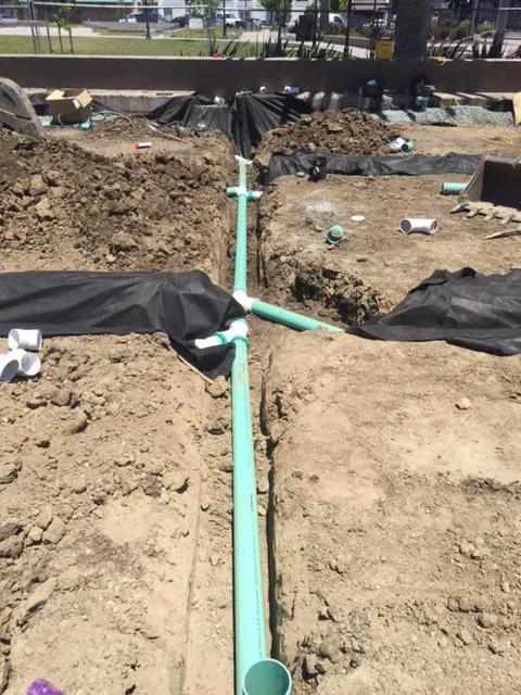 Picture of  A carefully constructed drainage system, with vibrant green pipes laid in trenchwork, showcases Bay Area Drainage, Inc.'s commitment to quality outcomes. Recognized for expertise and quality, the company's craftsmanship ensures efficient water management. Copyright ©2025 Diamond Certified Resource.

 - Bay Area Drainage, Inc.