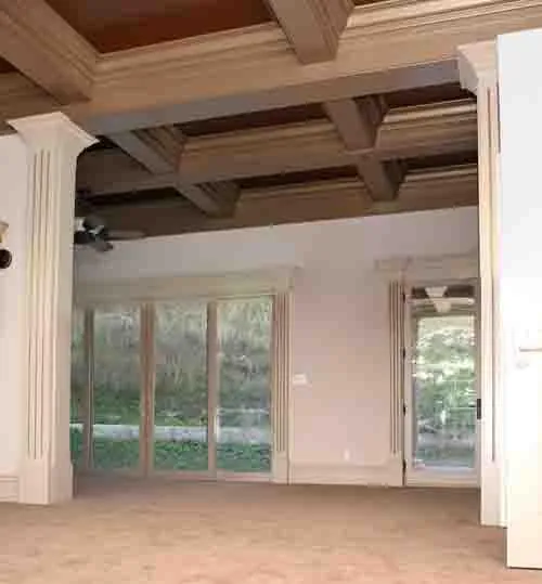 Picture of The warm tones of a freshly painted coffered ceiling create an inviting atmosphere in this sunlit room, showcasing Steve Roberts Painting's commitment to quality outcomes. Recognized for expertise and quality, the companyâ€™s attention to detail is evident in every stroke. Copyright ©2025 Diamond Certified Resource

 - Steve Roberts Painting