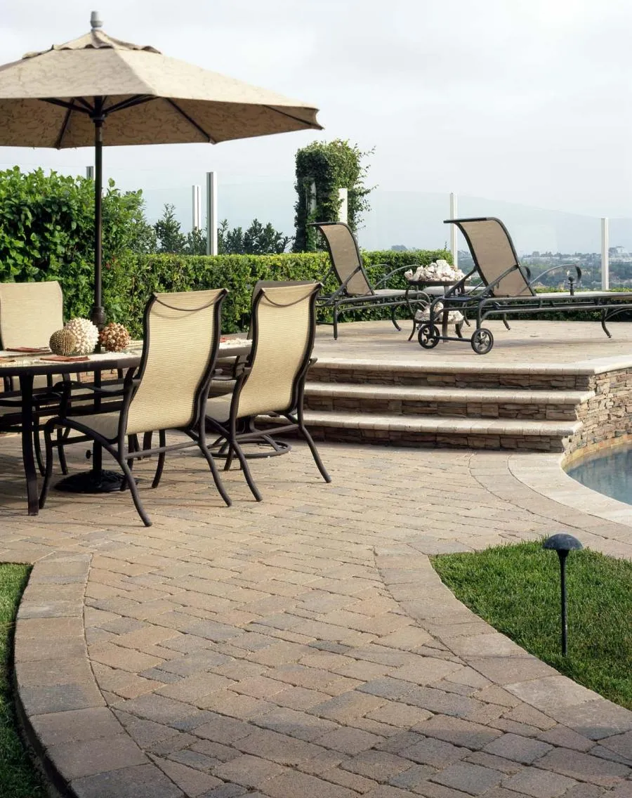 Picture of  A serene patio setting showcases the meticulous work of Black Diamond Paver Stones & Landscape, Inc. The elegant stone walkway and inviting seating hint at a commitment to quality outcomes. This transformative space embodies the company’s focus on creating outdoor sanctuaries. Copyright ©2025 Diamond Certified Resource.

 - Black Diamond Paver Stones & Landscape, Inc.