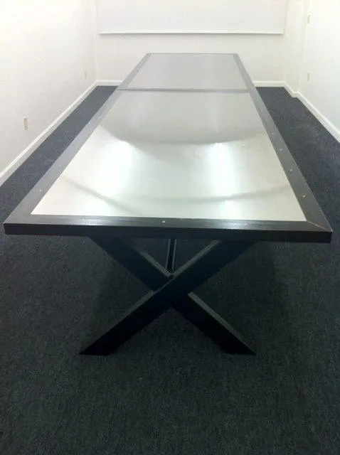 Picture of  A sleek conference table crafted by Bell Products, Inc. stands ready in a minimalist meeting room, embodying the company's commitment to quality outcomes. Recognized for expertise and quality, Bell Products consistently achieves a Highest in Quality rating. Copyright ©2025 Diamond Certified Resource.

 - Bell Products, Inc.