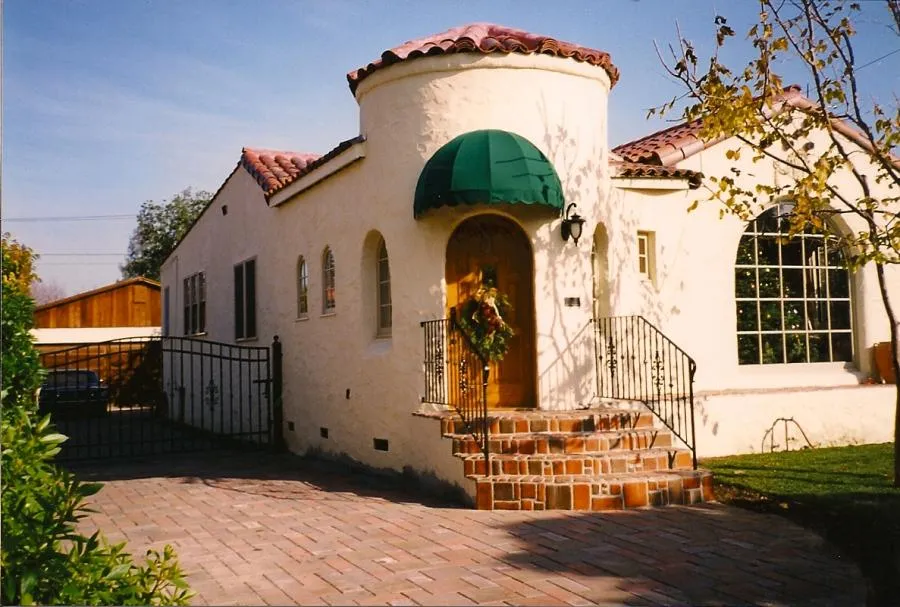 Picture of A beautifully renovated home showcases the charm of its stucco facade and Mediterranean roof, subtly reflecting the craftsmanship of G. D. Enterprise, recognized for expertise and quality in its work. Copyright ©2025 Diamond Certified Resource

 - G. D. Enterprise