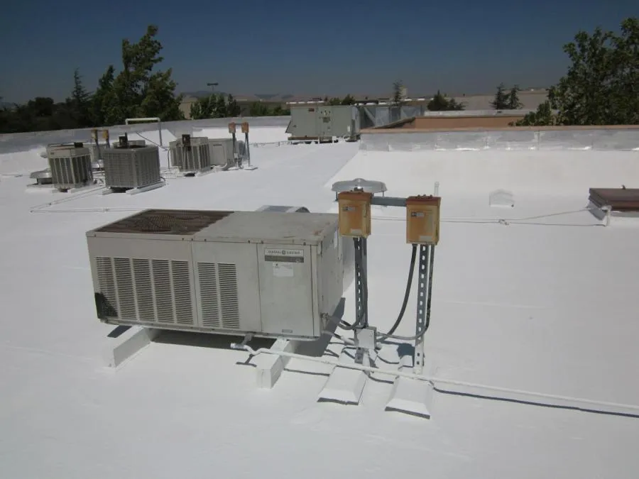 Picture of Bathed in sunlight, a meticulously maintained rooftop HVAC system reflects Ben's Roofing, Inc.'s commitment to quality outcomes. The company has consistently achieved a Highest in Quality rating, ensuring reliable service and performance. Copyright ©2025 Diamond Certified Resource. - Ben's Roofing, Inc.