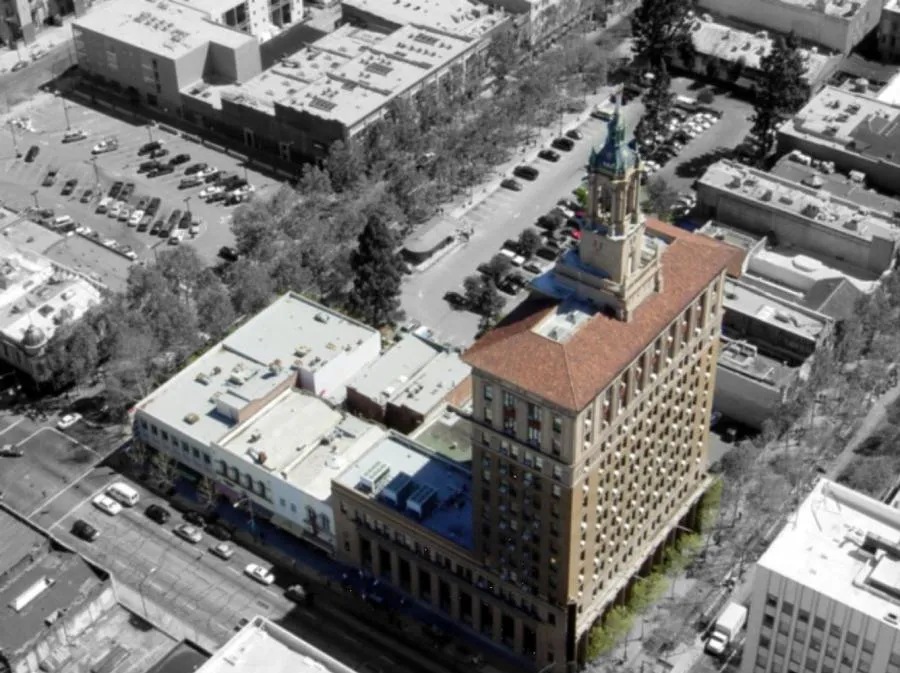 Picture of  An aerial view captures the intricate rooftop of a historic building, illustrating All Seasons Roofing & Waterproofing, Inc.'s commitment to quality outcomes. Notably recognized for expertise and quality, the company ensures structures are protected and preserved. Copyright ©2025 Diamond Certified Resource.

 - All Seasons Roofing & Waterproofing, Inc.