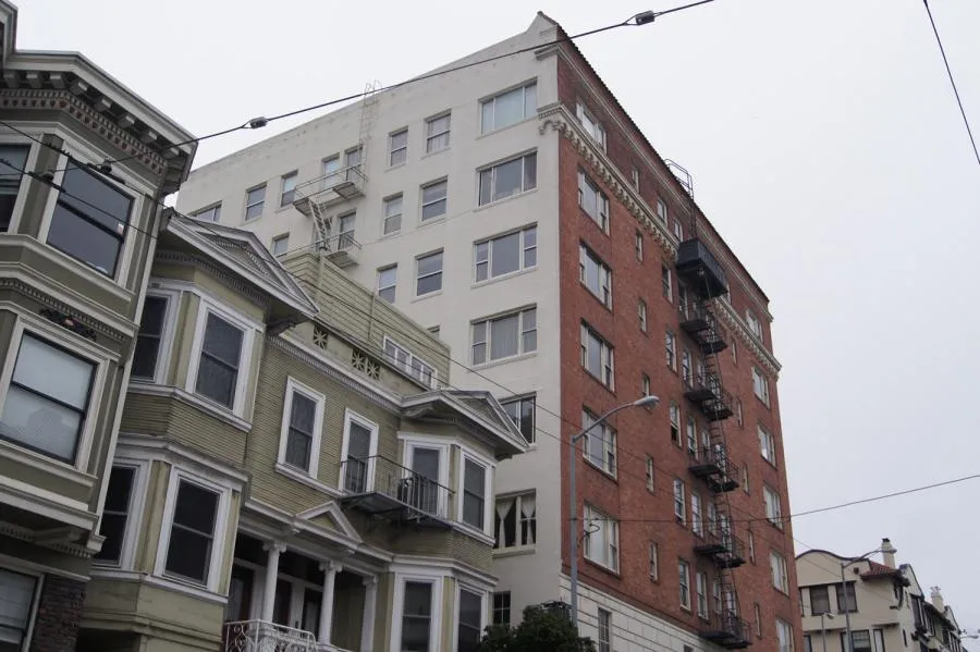 Picture of The historic architecture of the buildings is a testament to their enduring craftsmanship. Michael Sack Painting, Inc. contributes to preserving such urban landscapes with quality outcomes. Copyright ©2025 Diamond Certified Resource. - Michael Sack Painting, Inc.