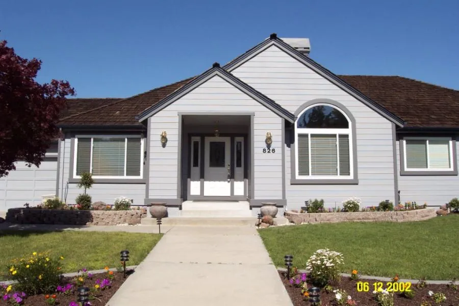 Picture of  The neat symmetry of this home's windows highlights West Coast Windows and Doors, Inc.'s focus on quality outcomes, creating inviting and elegant exteriors. Copyright ©2025 Diamond Certified Resource.

 - West Coast Windows and Doors, Inc.