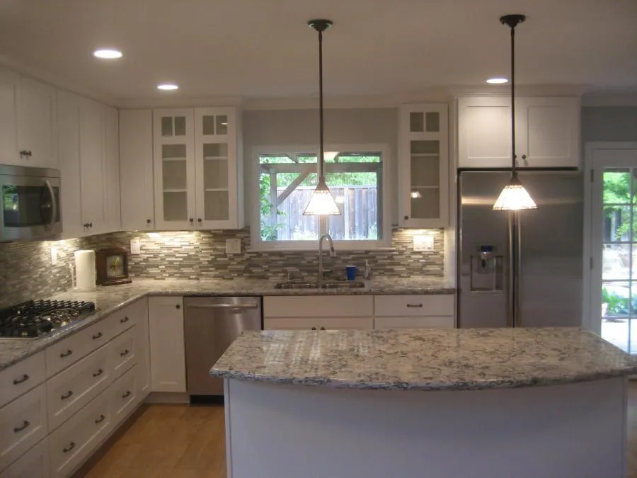 Picture of A serene kitchen remodel by Cardinal Builder, Inc. showcases elegant granite countertops and modern lighting, creating a welcoming space for family gatherings. The company is recognized for expertise and quality. Copyright ©2025 Diamond Certified Resource

 - Cardinal Builder, Inc