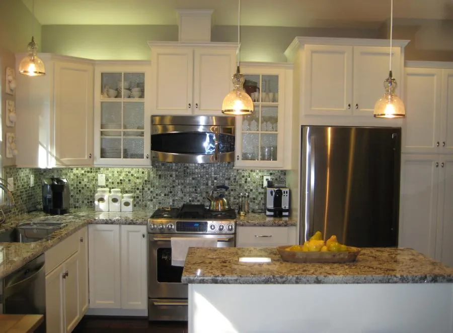 Picture of In a perfectly illuminated kitchen, Cardinal Builder, Inc's craftsmanship is showcased through elegant cabinetry and polished countertops. Known for high customer satisfaction ratings, their attention to detail transforms spaces seamlessly. Copyright ©2025 Diamond Certified Resource - Cardinal Builder, Inc