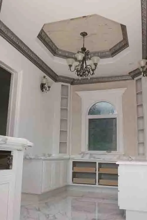 Picture of In this elegant room, the work of Steve Roberts Painting is apparent in the intricate molding and wall finishes, reflecting their top-rated quality. Such craftsmanship not only enhances the aesthetic but ensures lasting results. Copyright ©2025 Diamond Certified Resource

 - Steve Roberts Painting