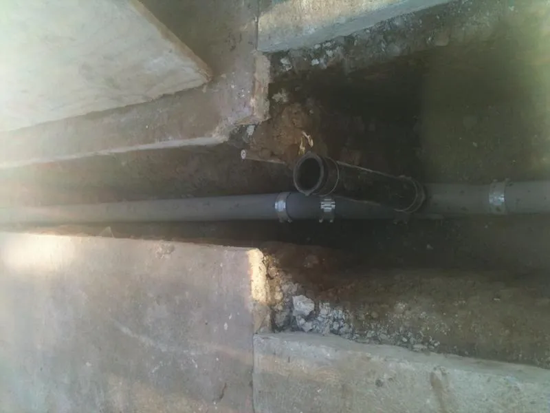 Picture of Amidst a trench of exposed earth and concrete, Atlas Plumbing & Rooter expertly lays a robust pipeline, showcasing their focus on quality outcomes in every detail. Copyright ©2025 Diamond Certified Resource

 - Atlas Plumbing & Rooter