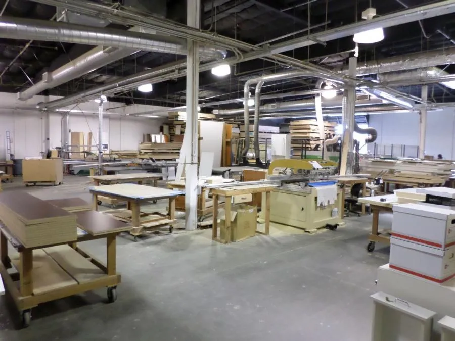 Picture of In a workshop filled with precision and purpose, Closet Factory exemplifies its earned Diamond Certified status with organized craftsmanship. Here, quality materials await transformation into custom storage solutions. The companyâ€™s focus on quality outcomes is evident throughout the space. Copyright ©2025 Diamond Certified Resource - Closet Factory