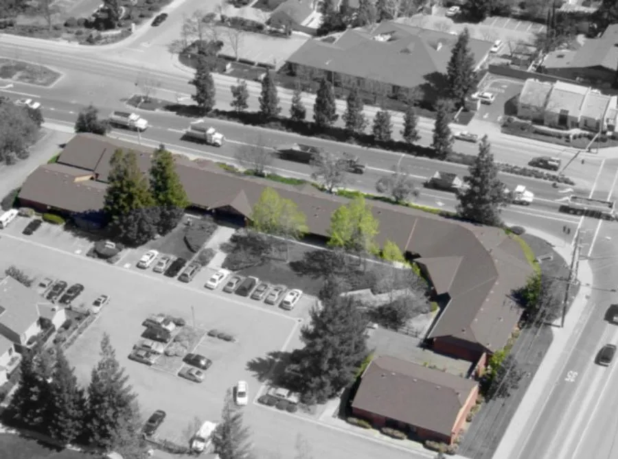 Picture of  An aerial view reveals the intricate layout of a commercial building, its rooftops meticulously maintained by All Seasons Roofing & Waterproofing, Inc., recognized for expertise and quality. Copyright ©2025 Diamond Certified Resource.

 - All Seasons Roofing & Waterproofing, Inc.