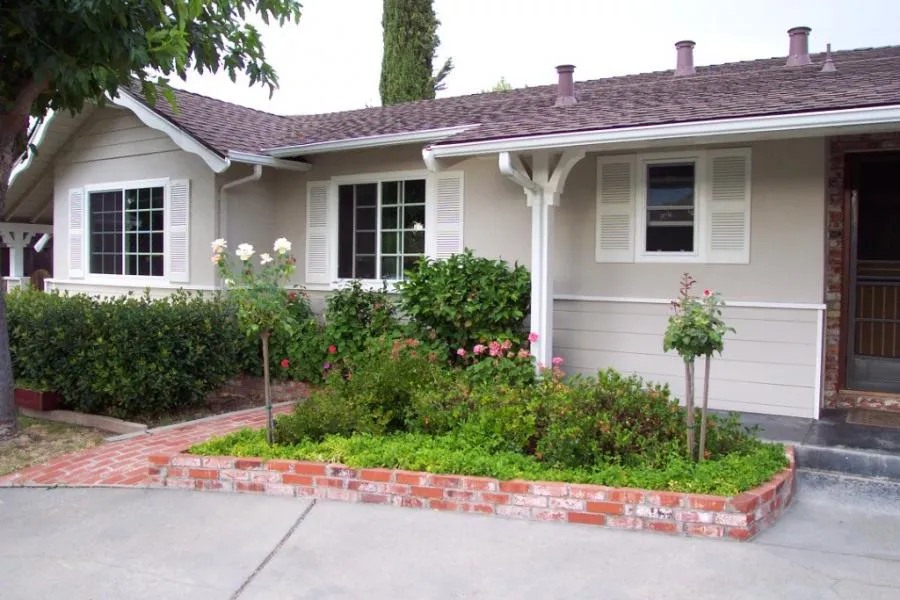 Picture of  A freshly renovated facade by West Coast Windows and Doors, Inc. showcases pristine shutters and elegant windows, embodying the company's focus on quality outcomes. Copyright ©2025 Diamond Certified Resource.

 - West Coast Windows and Doors, Inc.