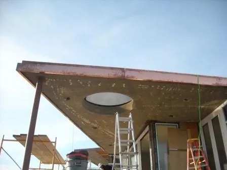 Picture of  A precise moment of construction unfolds as a ladder reaches toward an unfinished roof, framed by clear skies. Innovative Mechanical, Inc. is known for its high customer satisfaction ratings, underscoring the quality visible in this project. Copyright ©2025 Diamond Certified Resource.

 - Innovative Mechanical, Inc.