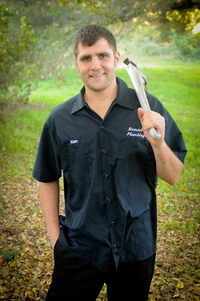 Picture of In a serene outdoor setting, a Roman's Plumbing, Inc. technician stands confidently, tool in hand, embodying the company's dedication to quality outcomes. Recognized for expertise and quality, they consistently earn top ratings. Copyright ©2025 Diamond Certified Resource. - Roman's Plumbing, Inc.