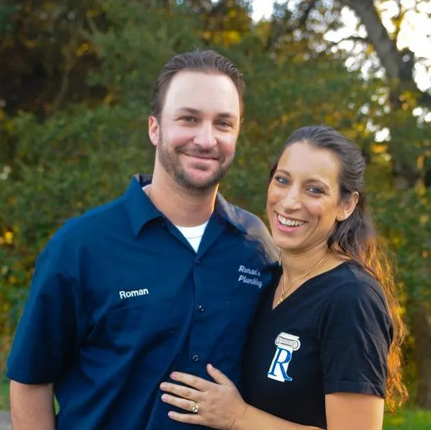 Picture of A moment of warmth and connection shines as two team members of Roman's Plumbing, Inc. stand together, embodying the company's commitment to high customer satisfaction ratings. Their smiles reflect the quality and dedication that customers have come to trust. Copyright ©2025 Diamond Certified Resource. - Roman's Plumbing, Inc.