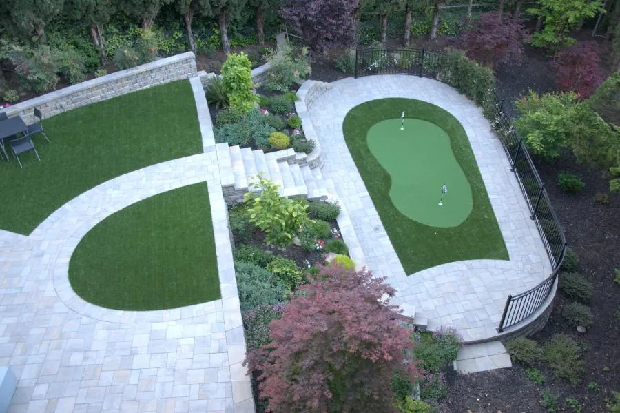 Picture of  Black Diamond Paver Stones & Landscape, Inc. transforms residential landscapes with precision, as seen in this artful combination of lush greenery and a custom putting green. Recognized for expertise and quality, the company’s commitment to excellence is evident in every detail. Copyright ©2025 Diamond Certified Resource.

 - Black Diamond Paver Stones & Landscape, Inc.