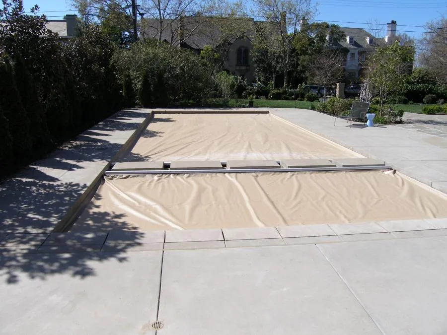 Picture of In a tranquil setting, a fully covered pool hints at the meticulous care Classic Pools invests in safeguarding your oasis. Renowned for quality outcomes, Classic Pools delivers peace of mind. Copyright ©2025 Diamond Certified Resource

 - Classic Pools