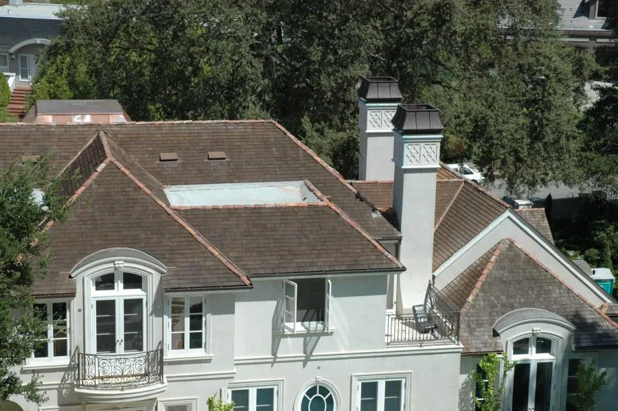 Picture of Nestled amid lush greenery, this elegant home showcases a meticulously installed roof by Los Gatos Roofing, reflecting the company's commitment to quality outcomes. Recognized for expertise and quality, Los Gatos Roofing ensures a seamless blend of aesthetics and durability. Copyright ©2025 Diamond Certified Resource

 - Los Gatos Roofing