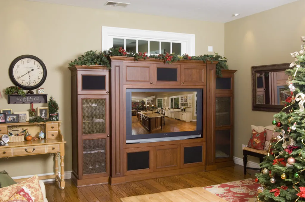 Picture of In this cozy living room, a beautifully crafted wooden entertainment center by Diablo Valley Cabinetry blends seamlessly with festive holiday decor, emphasizing the company's focus on quality outcomes. Copyright ©2025 Diamond Certified Resource

 - Diablo Valley Cabinetry