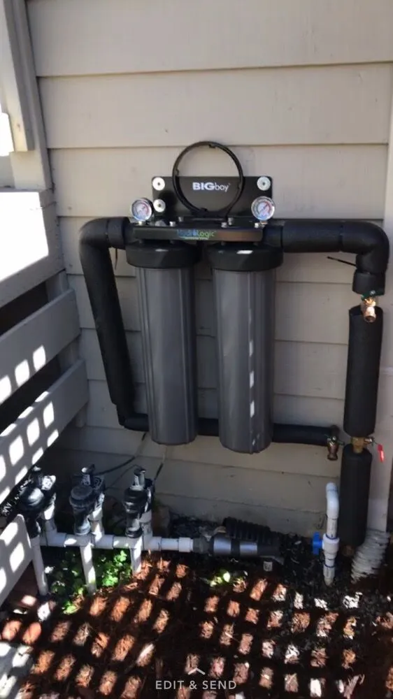 Picture of In a quiet corner, a robust filtration system stands, emblematic of Elite Plumbing Services' commitment to quality outcomes. This setup, a testament to their high customer satisfaction ratings, ensures pure and reliable water flow. Copyright ©2025 Diamond Certified Resource

 - Elite Plumbing Services