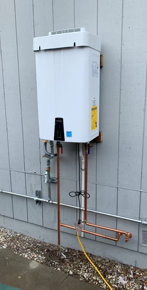 Picture of A newly installed tankless water heater showcases Elite Plumbing Servicesâ€™ commitment to quality outcomes. The sleek, efficient design exemplifies their focus on high customer satisfaction. Copyright ©2025 Diamond Certified Resource

 - Elite Plumbing Services