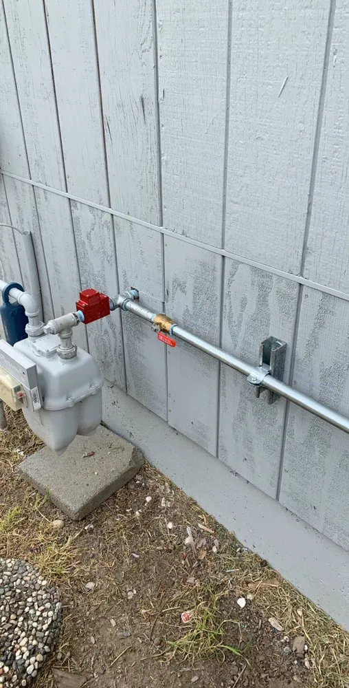 Picture of A precisely installed plumbing line against a weathered facade showcases Elite Plumbing Services' commitment to quality outcomes. Excellence in execution is evident in every detail. Copyright ©2025 Diamond Certified Resource

 - Elite Plumbing Services