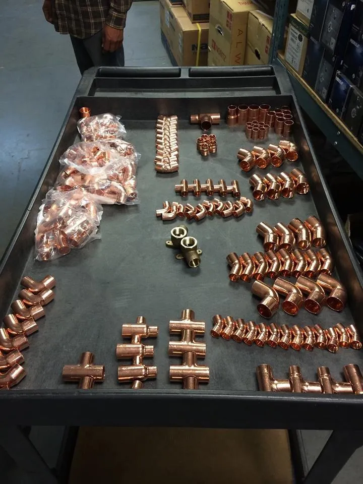 Picture of  An organized display of copper fittings reveals Gladiator Repipe, Inc.'s commitment to structured precision, a testament to their expertise and quality. Recognized for their top-rated quality, the company ensures high customer satisfaction. Copyright ©2025 Diamond Certified Resource.

 - Gladiator Repipe, Inc.