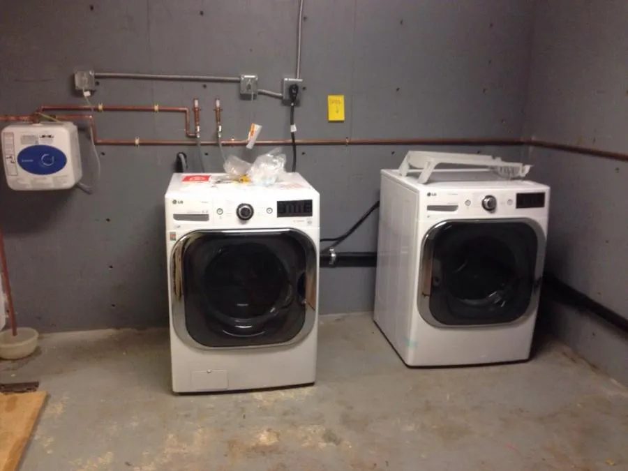 Picture of  In a pristine utility room, Gladiator Repipe, Inc. showcases expertly installed plumbing for modern washers, exemplifying their commitment to quality outcomes. Recognized for expertise and quality, they ensure every connection is precise. Copyright ©2025 Diamond Certified Resource.

 - Gladiator Repipe, Inc.