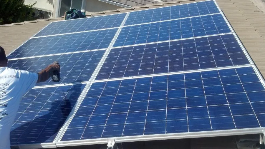 Picture of A technician from High Definition Solar meticulously cleans a rooftop solar panel, ensuring optimal energy efficiency. Recognized for expertise and quality, the company maintains high standards. Copyright ©2025 Diamond Certified Resource

 - High Definition Solar