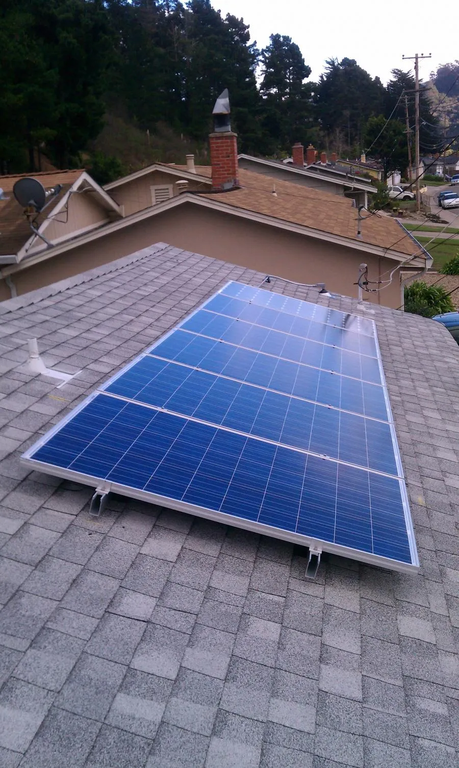 Picture of Nestled on a suburban rooftop, a solar panel quietly converts sunlight into energy, highlighting High Definition Solar's dedication to sustainability and innovation. With a consistent Highest in Quality rating, their installations blend seamlessly into everyday settings. Copyright ©2025 Diamond Certified Resource - High Definition Solar