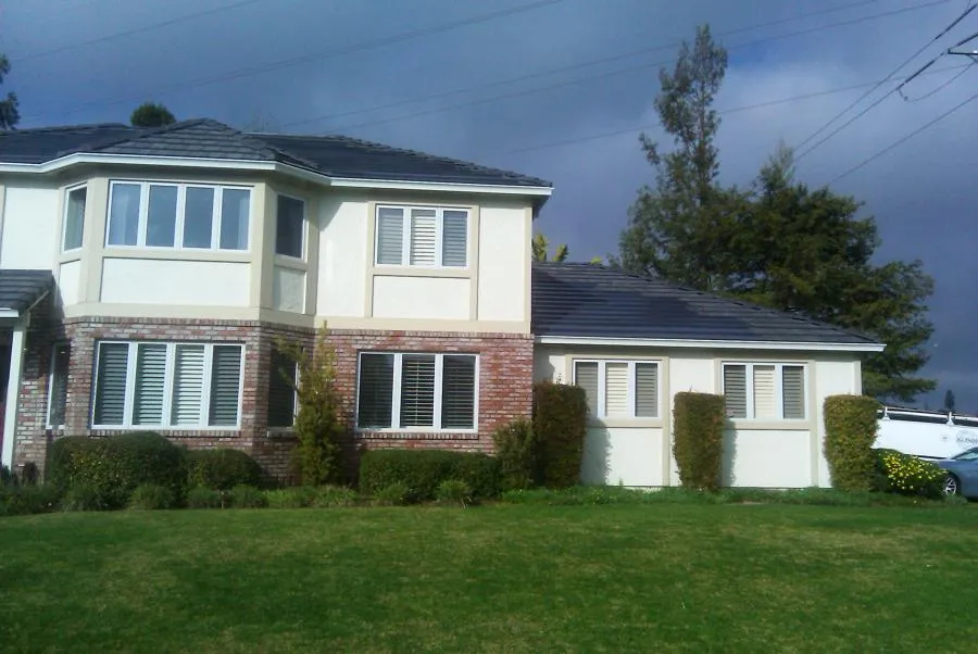 Picture of  The seamless blend of brick and stucco on this home showcases the craftsmanship of All Seasons Roofing & Waterproofing, Inc., where quality outcomes are the focus. Copyright ©2025 Diamond Certified Resource.

 - All Seasons Roofing & Waterproofing, Inc.