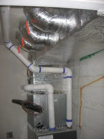 Picture of  An intricate HVAC system installation by Innovative Mechanical, Inc. showcases meticulous attention to detail, with insulated ducts and precise piping. Known for its high customer satisfaction ratings, the company continues to deliver top-quality outcomes. Copyright ©2025 Diamond Certified Resource.

 - Innovative Mechanical, Inc.