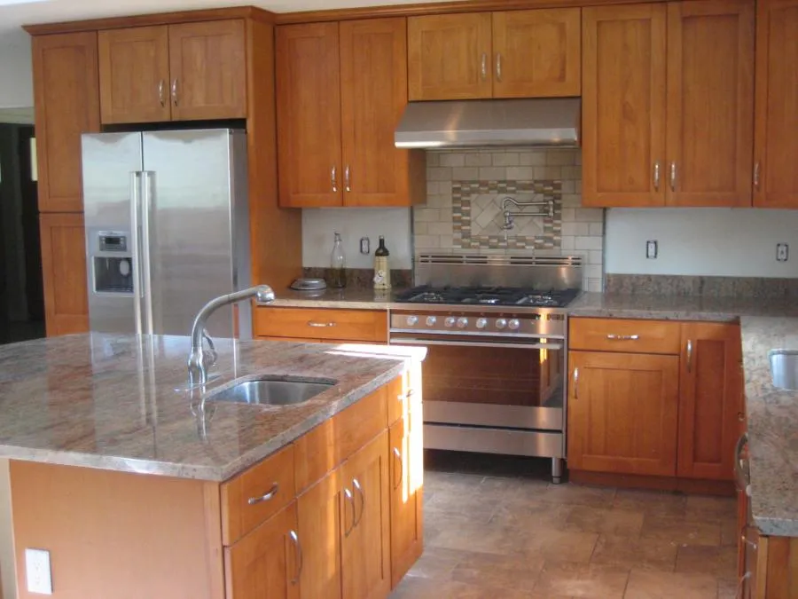 Picture of A thoughtfully designed kitchen showcases G.D. Enterpriseâ€™s commitment to quality, featuring elegantly crafted wood cabinetry and a sleek granite island. As a company recognized for expertise and quality, their work creates spaces of lasting beauty. Copyright ©2025 Diamond Certified Resource

 - G. D. Enterprise