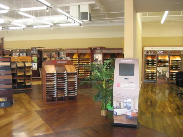 Picture of In the inviting showroom of The Floor Store, a diverse array of flooring samples is meticulously displayed, inviting customers to explore quality options. The company is recognized for expertise and quality. Copyright ©2025 Diamond Certified Resource - The Floor Store
