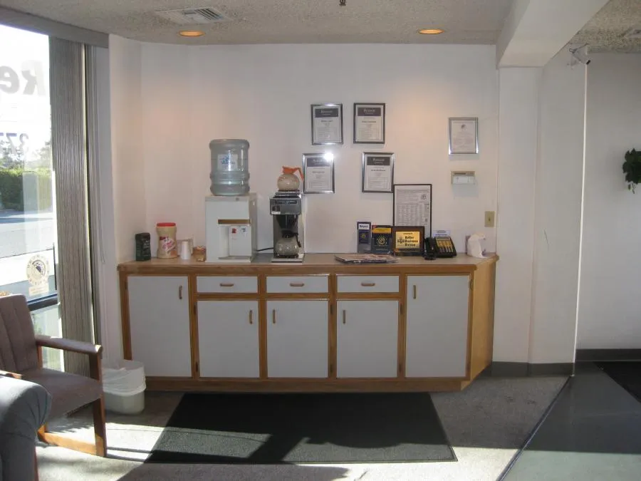 Picture of In the lobby of Renson Automotive, a well-maintained refreshment area with neatly displayed certifications reflects the companyâ€™s dedication to quality outcomes. Recognized for its expertise, Renson Automotive ensures every detail contributes to a welcoming customer experience. Copyright ©2025 Diamond Certified Resource

 - Renson Automotive