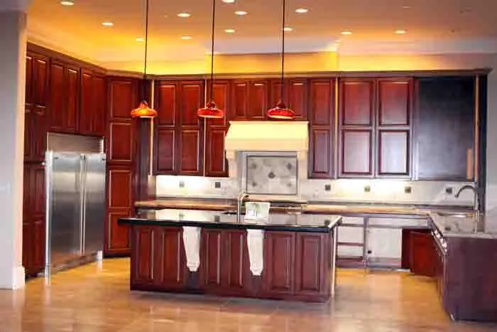 Picture of A kitchen enveloped in warm, rich wood tones reflects the meticulous craftsmanship of Steve Roberts Painting. The harmonious design emphasizes quality, aligning with their top-rated expertise. Copyright ©2025 Diamond Certified Resource

 - Steve Roberts Painting