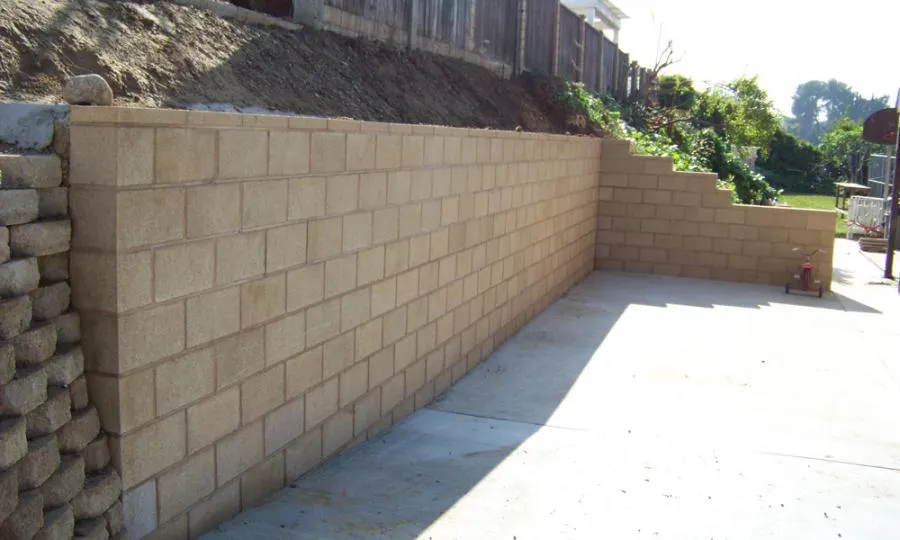 Picture of Kodiak Construction demonstrates its commitment to quality by constructing a sturdy retaining wall, seamlessly blending function and design. Recognized for expertise and quality, the company ensures dependable results. Copyright ©2025 Diamond Certified Resource - Kodiak Construction