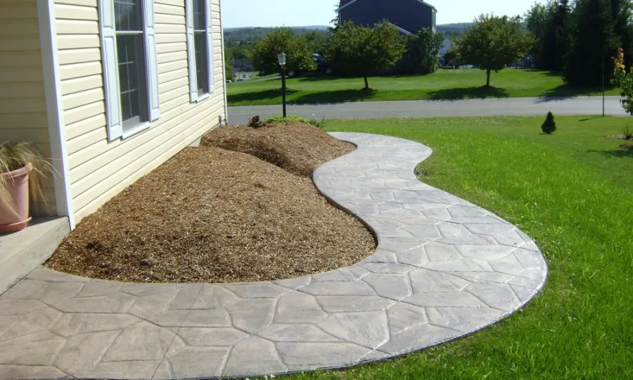 Picture of A beautifully crafted stone walkway curves gracefully beside a newly landscaped garden, reflecting Kodiak Construction's dedication to quality outcomes. Recognized for expertise and quality, they ensure each project enhances the home's aesthetic appeal. Copyright ©2025 Diamond Certified Resource

 - Kodiak Construction