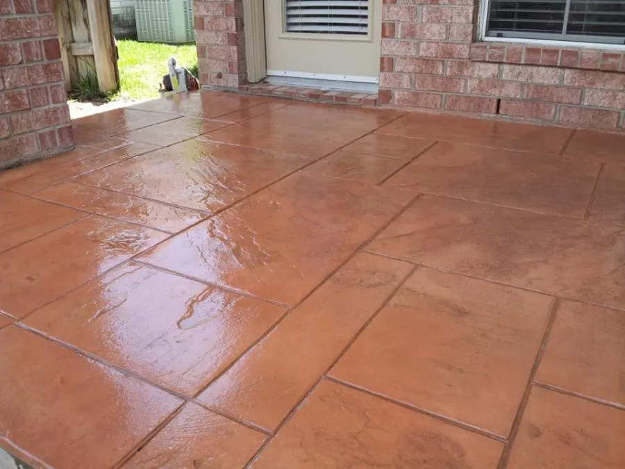 Picture of Kodiak Construction transforms outdoor spaces with precision and quality, exemplified by this meticulously finished patio. The gleaming surface hints at their focus on quality outcomes and customer satisfaction. Copyright ©2025 Diamond Certified Resource

 - Kodiak Construction