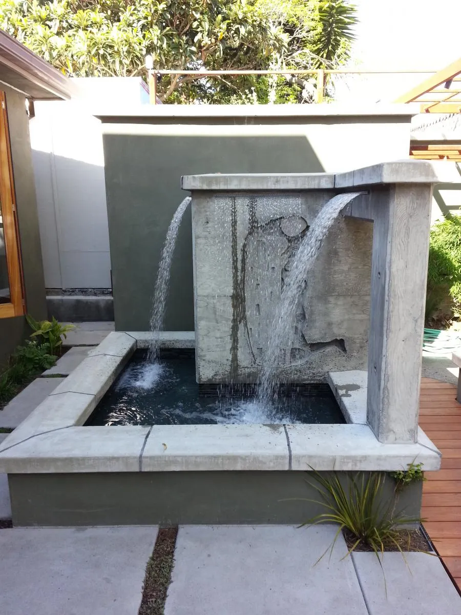 Picture of A serene backyard fountain designed with precision flows steadily under the afternoon sun. Classic Pools, recognized for expertise and quality, captures tranquility in every detail. Copyright ©2025 Diamond Certified Resource

 - Classic Pools
